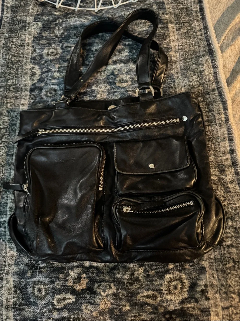 Echo Black Leather Multi-Pocket Messenger Bag